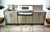 Stainless steel BBQ bench and cupboards Action Sheetmetal Roofing